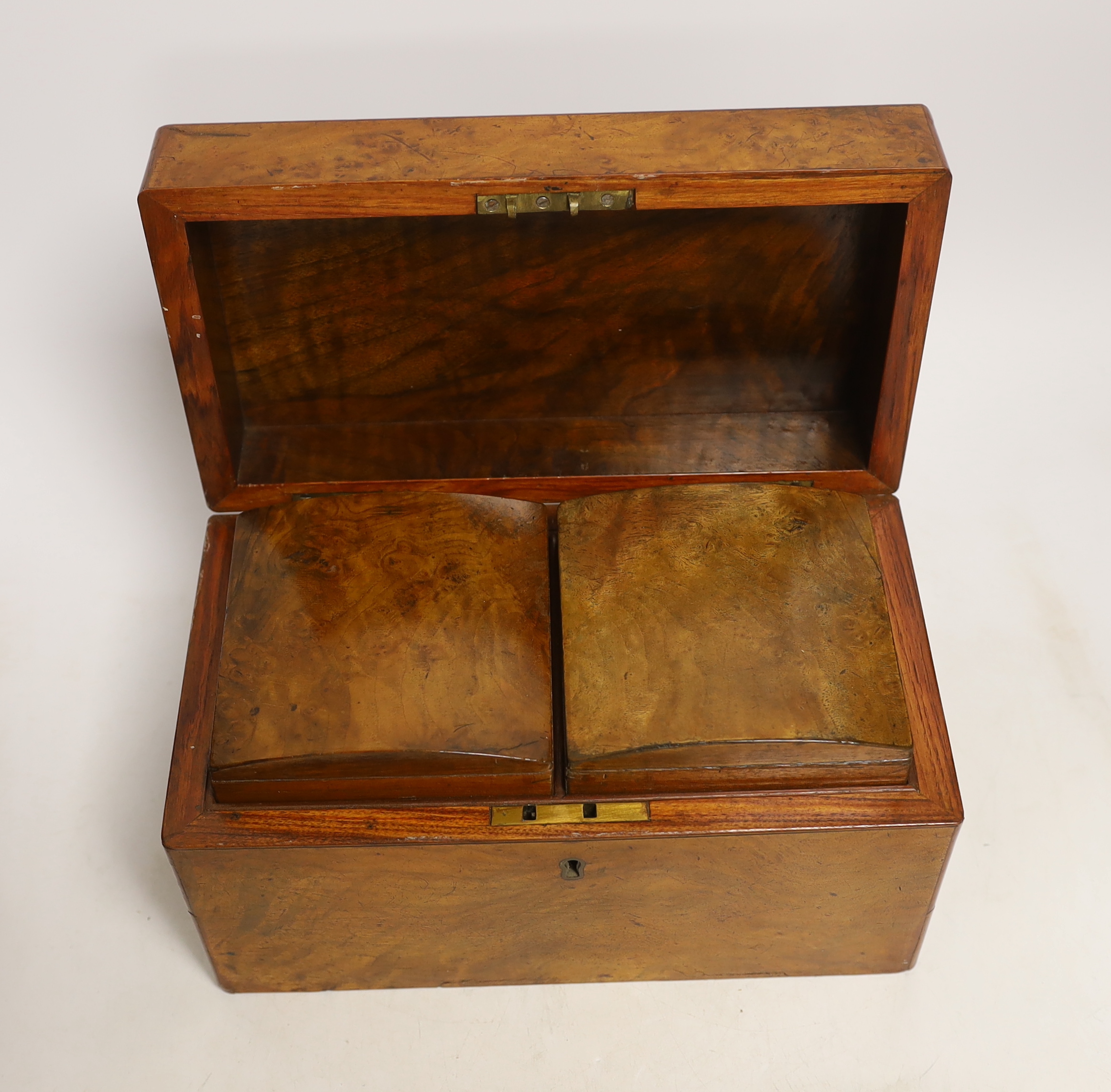 A Victorian walnut tea caddy and 19th century leather cased three draw telescope, signed Silberrad
